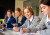 A male Senior School student smiles to camera during an Art class