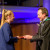 Paul Weinert presenting a Valedictory gift to a student at the Valedictory Service