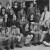 The 1975 Year 8 cohort sitting on the steps, dressed in their uniforms, on their orientation day before the opening of the new school year