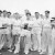 Well-respected coach Mr Clarrie Grimmett with Concordia's First XI cricket team in the 1940s standing around a set of stumps