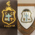 The College crest or badge depicted, with some slight visual variations, on four different items across a number of years