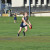 A Middle School student prepares to kick the football