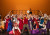 A group of cast members on stage performing in Concordia's production of Beauty and The Beast