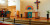 The front of the auditorium at St Peters Lutheran Church, Blackwood, with the altar, lectern and a group of singers preparing for a Sunday service