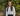 Georgina standing in an outdoor garden space