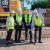 Sally Staggs, Paul Weinert and David Pisoni MP stand with Michael Paech who holds a shovel to turn the sod, marking the beginning of a major building project