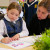 Student working with teacher