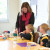 Teacher helping student T4 W2 2025