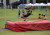 A Primary School student competing in high jump