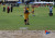 A Primary School student competing in long jump