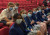A group of Year 11 Drama students sitting in the theatre waiting to see a production by State Theatre Company