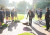 Our Head of College placing leaves on the fire at a traditional smoking ceremony in the Quad, led by Kaurna Elder Uncle Tamaru Smith