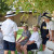 Students wearing crowns, pretending to be the king and queen, with other students gathered around during a Year 8 medieval feudal system simulation