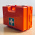 A bright orange first aid kit