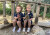 Two ELC children sitting on the bridge in the ELC garden