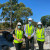 Kate Wood, Michael Paech and Sally Staggs standing on the first floor of our new three-storey building