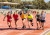 A group of students running in a race at Sports Day