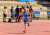 A student running in a race on Sports Day