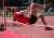 A student competing in high jump at Sports Day