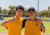 Two students smiling for the camera at the Middle and Senior School Sports Day