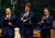 Three members of the 'Testosterphones' boys' choir performing at Harmony in the Chapel
