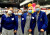 A group of Year 10 students in front on an exhibition booth at a Careers Expo