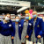 Four Year 10 students in front of an exhibition booth at the Careers Expo