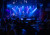 A band playing under blue lights at our 2023 Vocal Cabaret concert