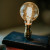 Light bulb and books