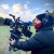 Cinematographer Maxx Corkindale operating a camera in an outdoor setting